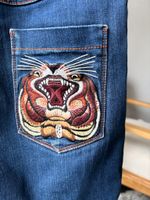 Джинсы Gucci, 140