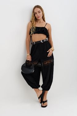 Брюки алладины из жатого хлопка черного цвета с кружевом