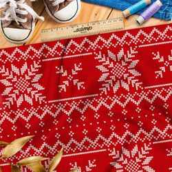 Ткань блэкаут вышивка из крупных мелых снежинок на красном свитере