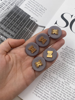 Пуговицы текстильные серые с золотом