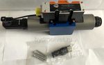 4WREE10V25-2X/G24K31/A1V - Пропорциональный распределитель с обратной связью по положению золотника со встроенным усилителем Ду10, A1 = ±10 В, номинальный расход 25 л/мин, схема V