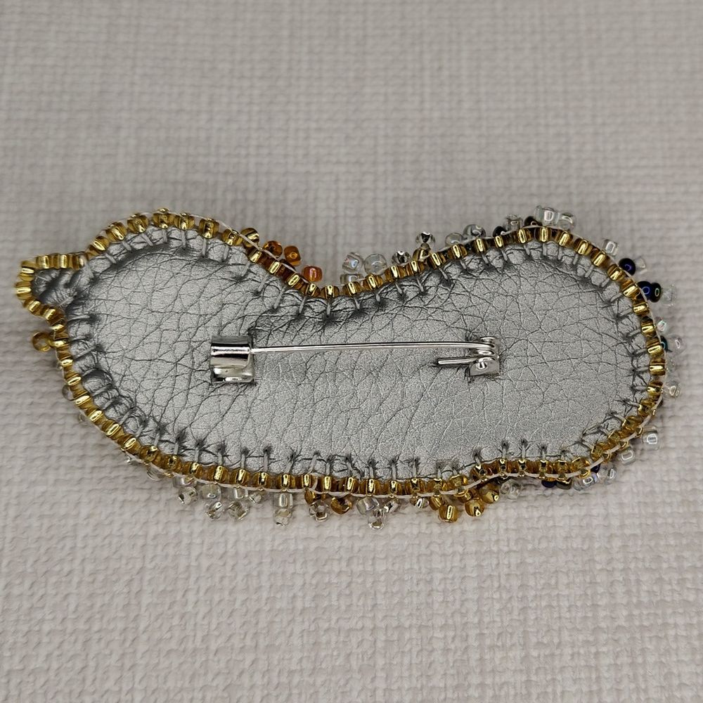 Авторская брошь Пёрышки