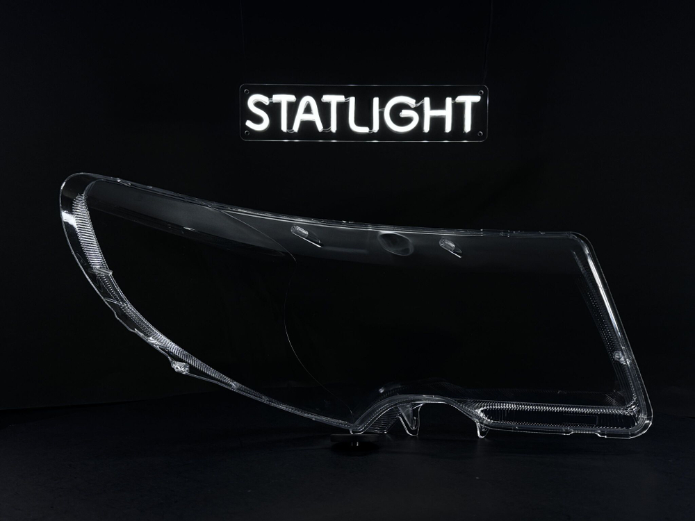 Левое стекло фары Skoda Superb 2 2008-2013