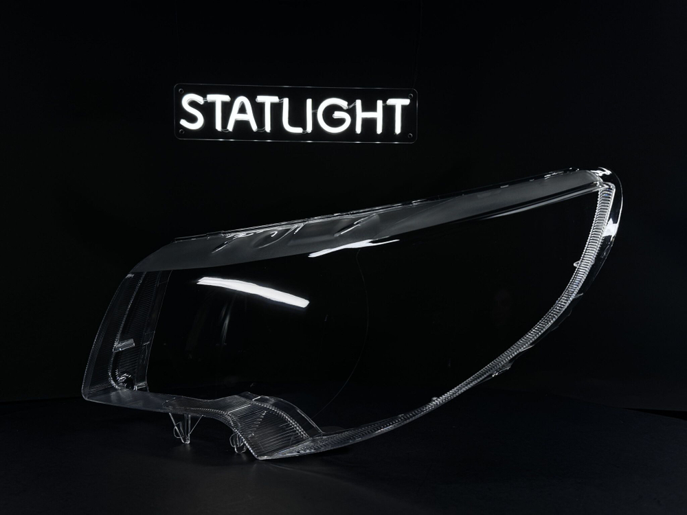 Левое стекло фары Skoda Superb 2 2008-2013