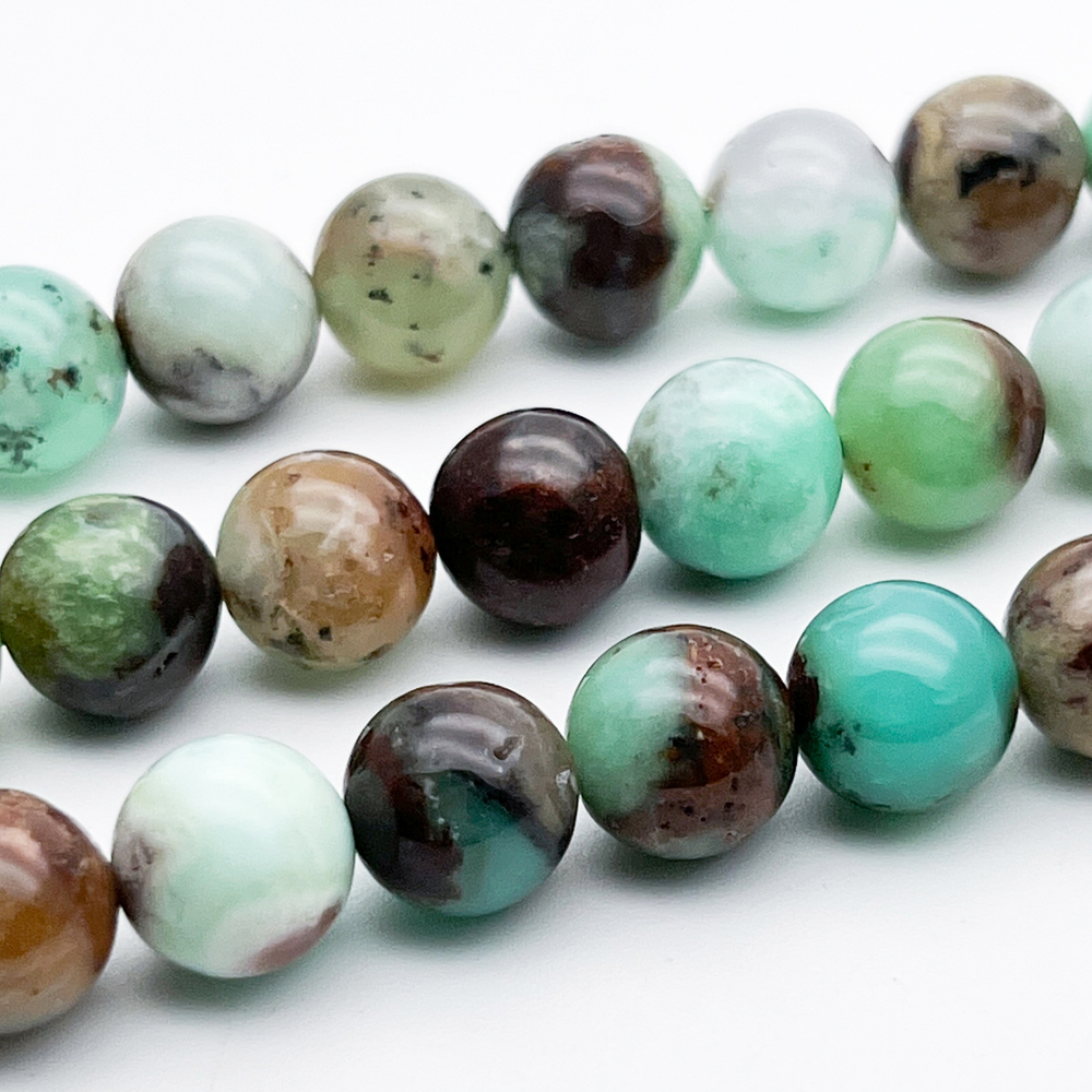 Хризопраз с включениями бусины, диаметр около 10,2-10,4 мм, цена за 9 шт (1/4 нити)