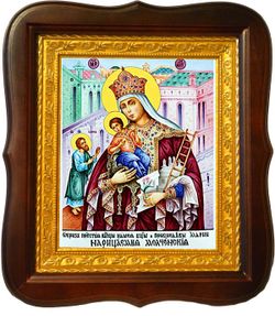 В киоте.	Молченская икона Божьей Матери на холсте.