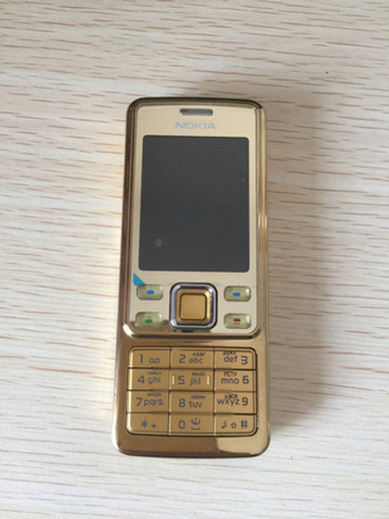 Мобильный телефон Nokia 6300 Gold