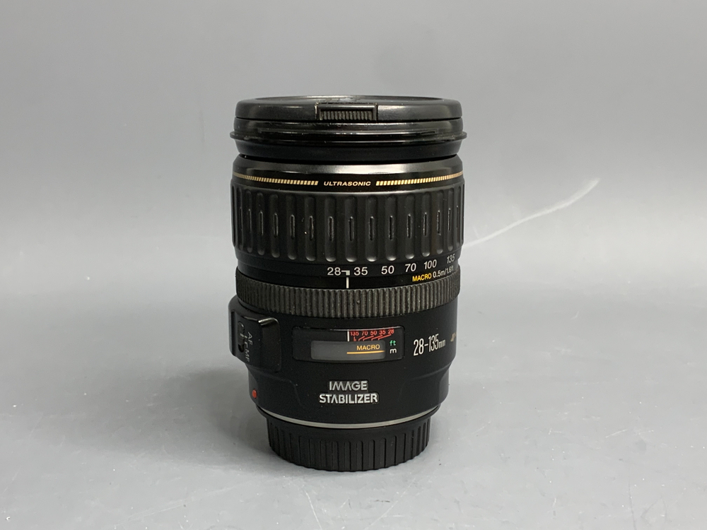 Canon EF 28-135mm IS USM пыль внутри