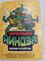 Коллекционная игровая карточка ЧЕРЕПАШКИ-НИНДЗЯ Боевая четвёрка: Путь ниндзя 257 (№ 257/260 ) "Раптарр. "Борцы за справедливость"