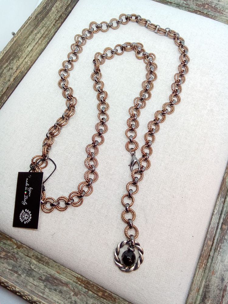 Цепь-трансформер длинная: овальные и рифленые золотые кольца, с горным хрусталем