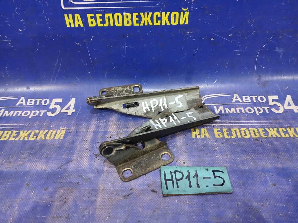 Петля капота левая NISSAN PRIMERA 1998