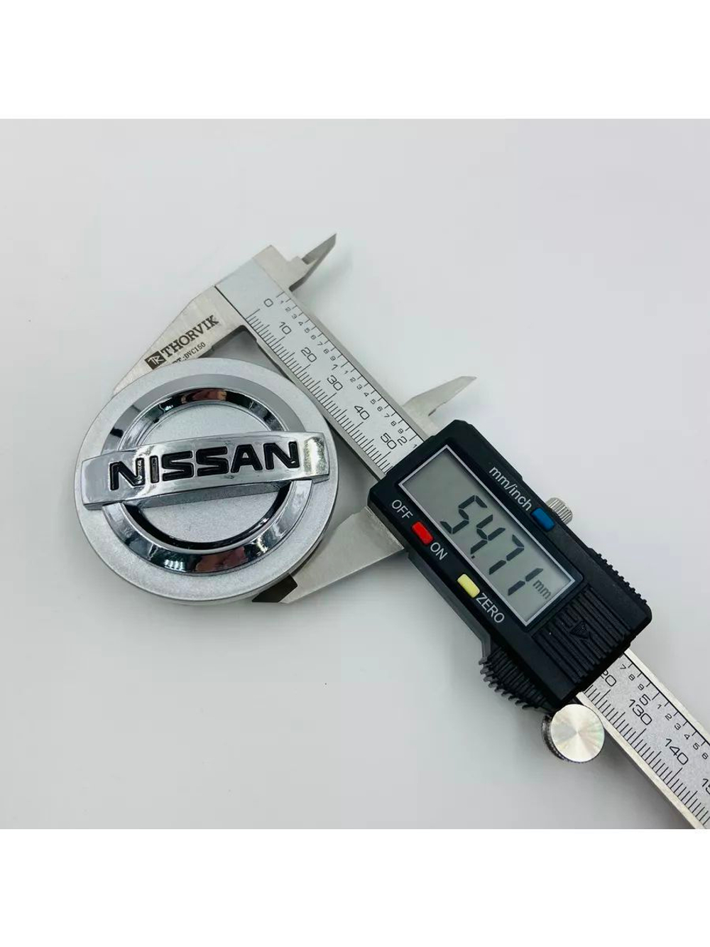 Колпачки заглушки на литые диски с эмблемой Nissan 59 мм 4 шт