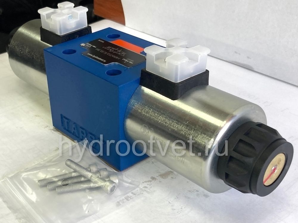 4WE10C31/OFCG24N9K4 - Гидрораспределитель золотниковый Ду 10 с электроуправлением G24, схема C (574/ОФ), возврат - OF = без пружины, с фиксатором