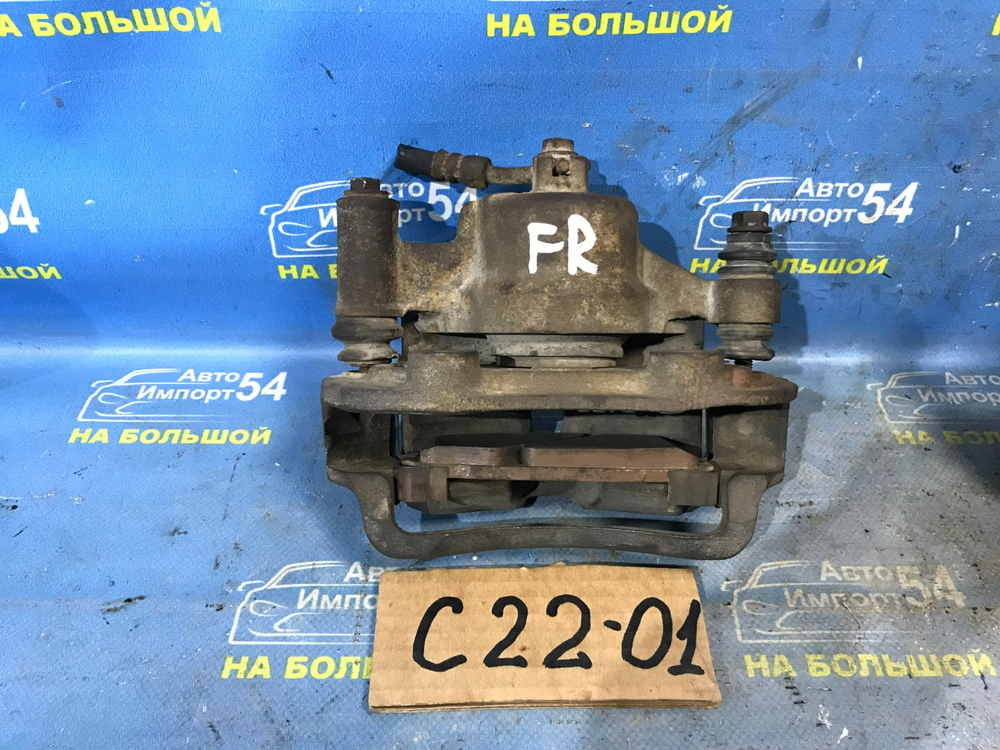 Суппорт тормозной передний правый NISSAN LARGO 1992