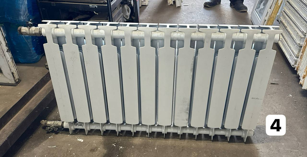 Биметаллический радиатор Б/У RIFAR MONOLIT 500 12 секц. бок.