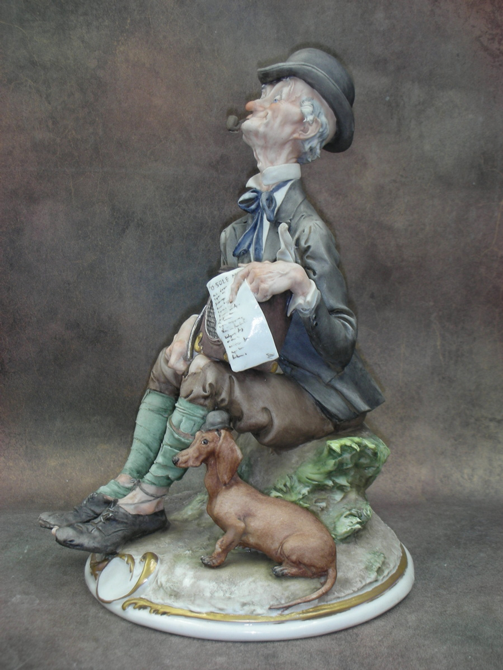 Статуэтка. Фарфор. Шарманщик. Capodimonte. Италия