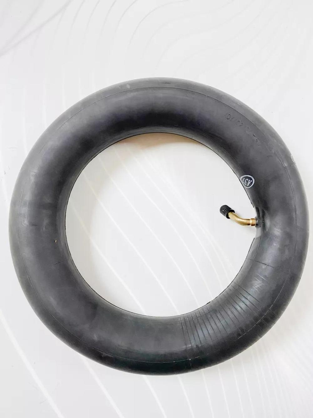 Камера 10x2.125 с изогнутым ниппелем