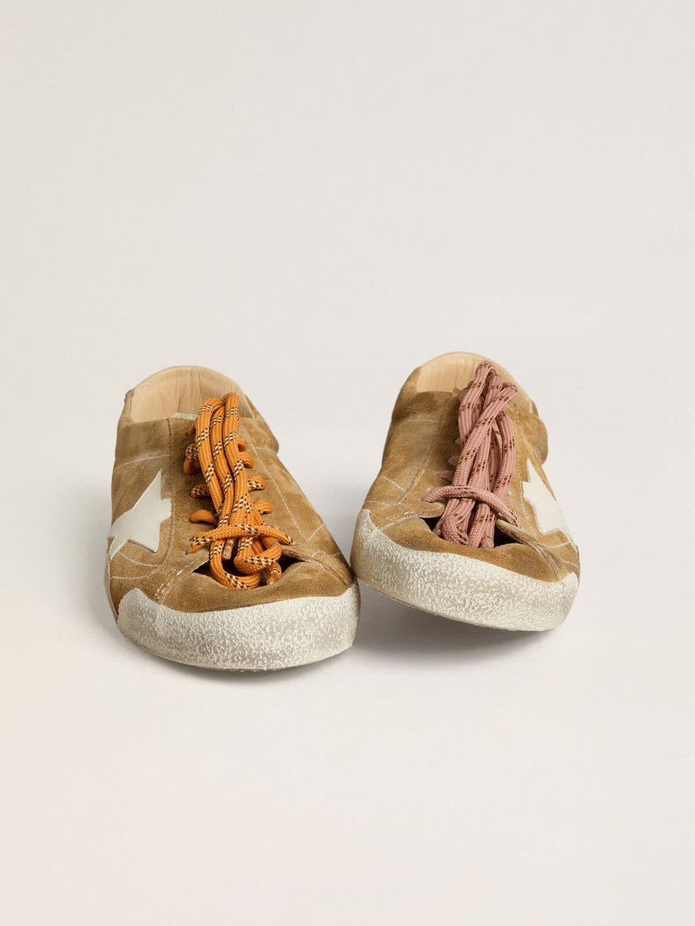 True Star in tobacco-colored suede with white star and platinum heel tab