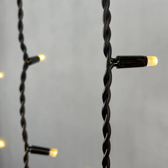 Светодиодная бахрома с колпачком 3,2*0,9 м., 168 теплых белых LED ламп, каучуковый черный провод, LTC (LL168-1-2WW)