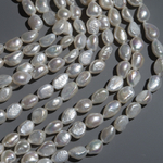 Жемчуг штучный культивированный крупный, белый, 10-15*8мм
