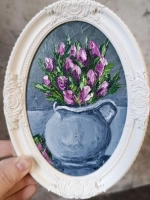 Картина в овальной рамке