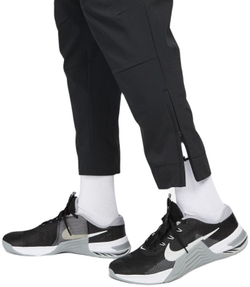 Мужские теннисные штаны Nike Unlimited Dri-Fit Zippered Cuff Versatile - черный