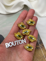 Пуговицы Скиапар. матовое золото в форме глаза с ресничками