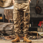 Брюки для мужчин свободные с накладными карманами и резинками внизу брючины от бренда JIELEINUO