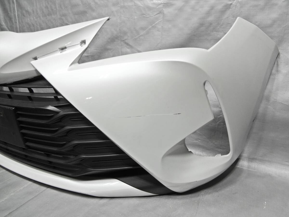 бампер передний Toyota Vitz KSP130 NSP135