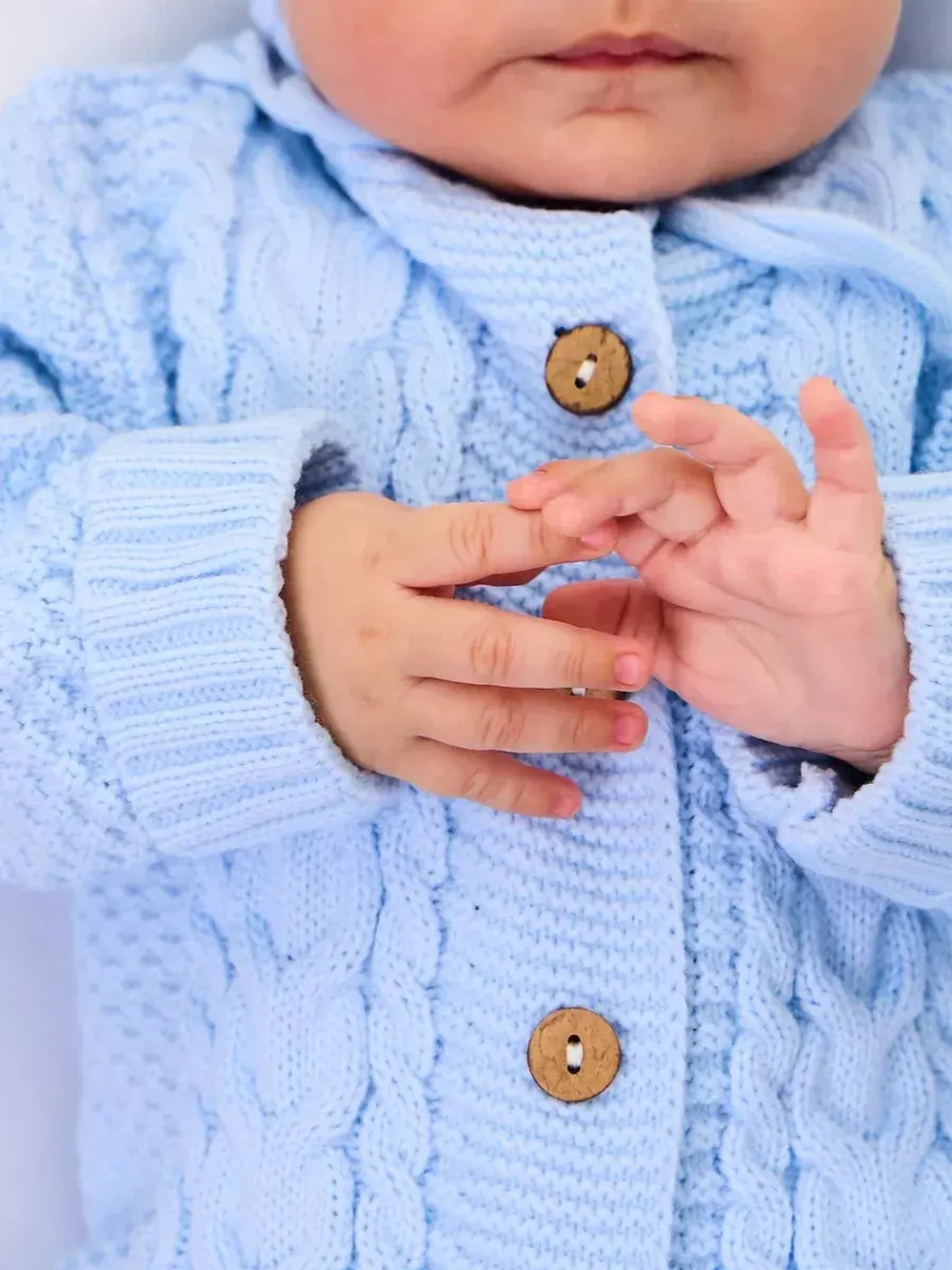 вязаный комбинезон для новорожденных