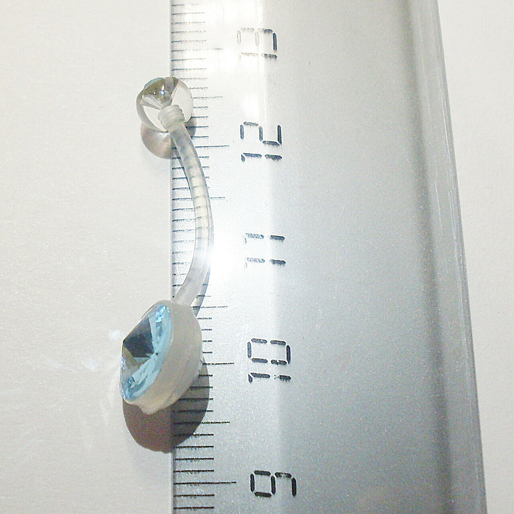Для пирсинга пупка ( длина 20 мм) с голубыми кристаллами. Материал биофлекс ( для беременных)