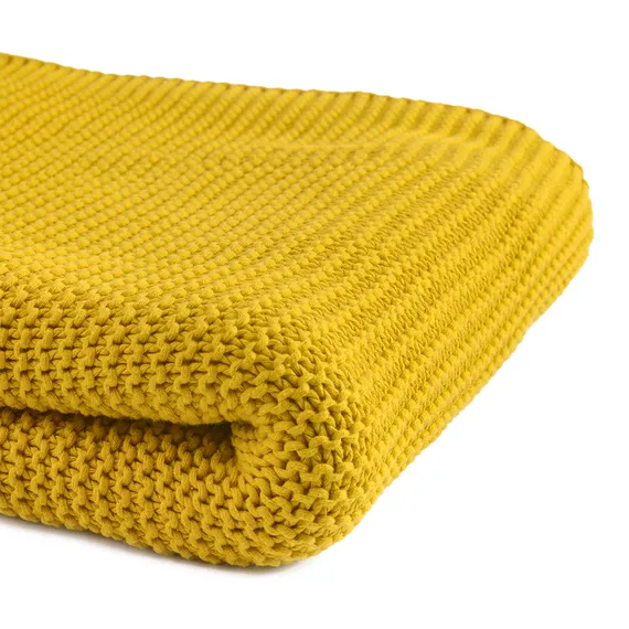 Плед из хлопка жемчужной вязки горчичного цвета Essential, 130х180 см