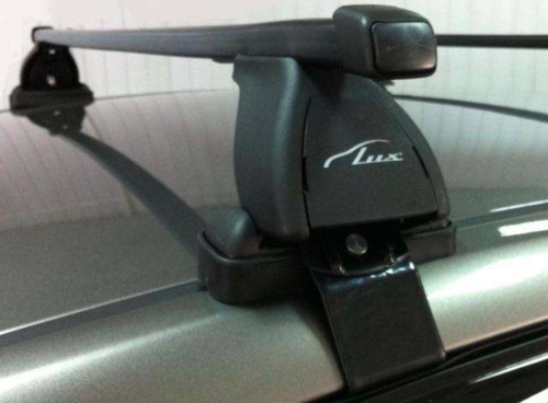 Багажник на крышу LUX с дугами 1,2м прямоугольными в пластике для Nissan Tiida Sedan 2004-(арт.690014+846097+691233)