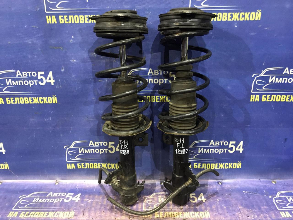 Стойка передняя левая NISSAN CUBE 2005-2008