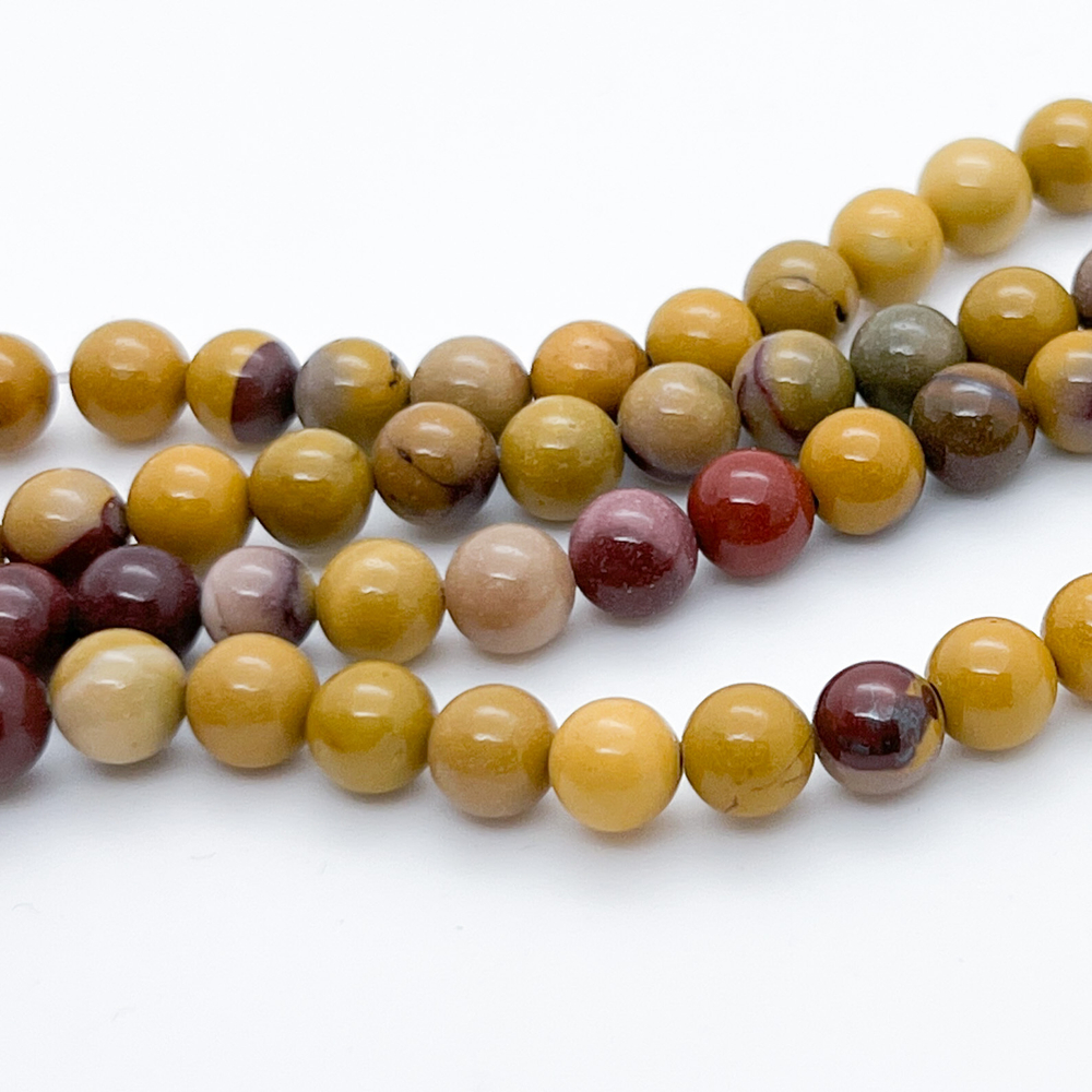 Мукаит, диаметр 6,4-6,6 мм, цена за 28-29 шт (1/2 нити)