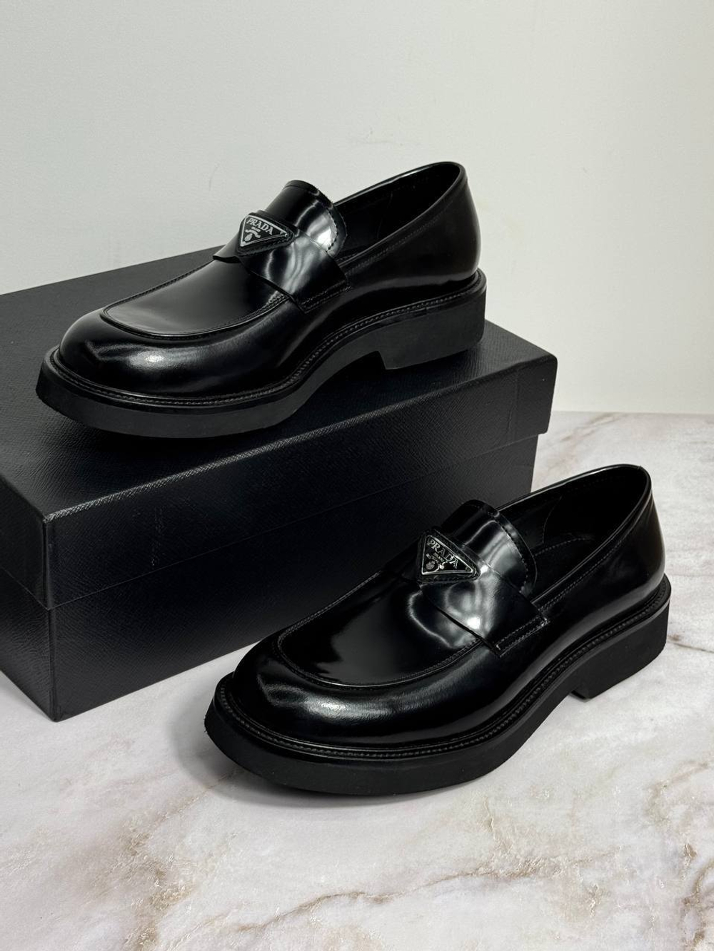 Лоферы Prada