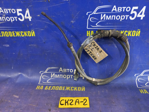 Трос ручника левый MITSUBISHI LANCER 1995