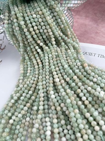 Нить бусин из тонированного кварца 6,4мм, гладкие