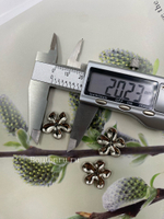 Пуговицы на прокол (пришивной элемент) серебристые в виде цветка