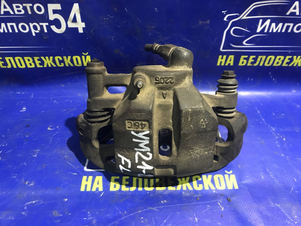 Суппорт тормозной передний левый TOYOTA LITEACE 1988