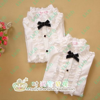 Блузка детская с рюшами и воротником-стойкой с бантом