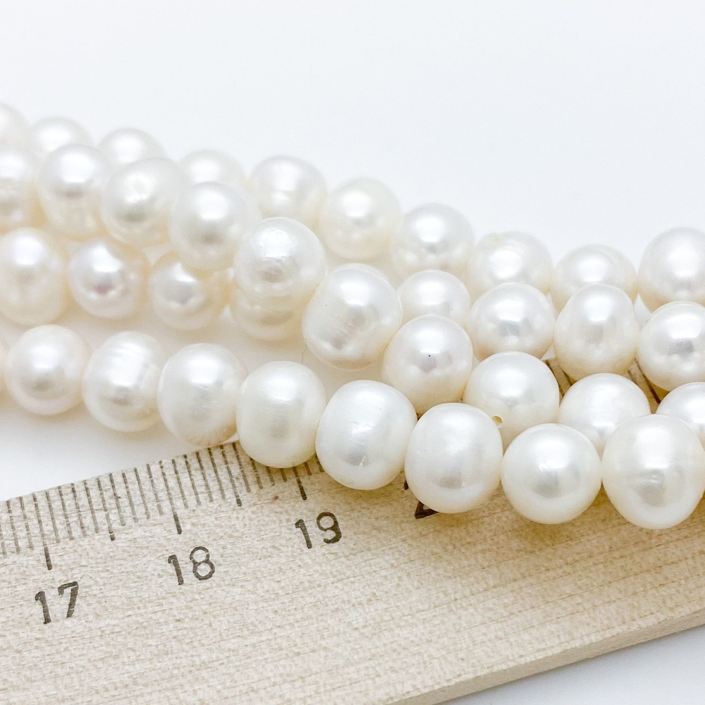 Жемчуг, размер около 6,5*8 мм, цена за 27-28 шт (1/2 нити)