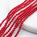 Коралл тонированный граненый бусины, диаметр около 2,5 мм, цена за отрезок 19 см (1/2 нити)