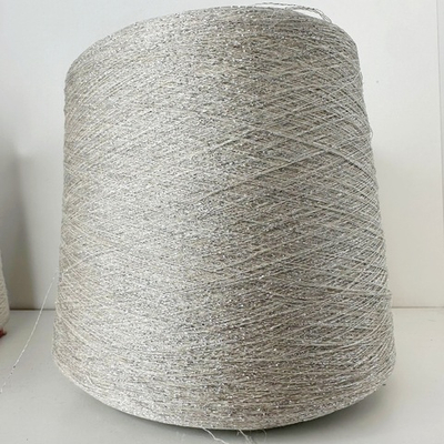 FRIZZANTE - Industria Italiana Filati; 70% вискоза, 15% металлизированный люрекс, 15% п/а; 3500м/100гр; col. 2102, цвет: серебро на светло-бежевой нити; Есть бобинка: 80 гр