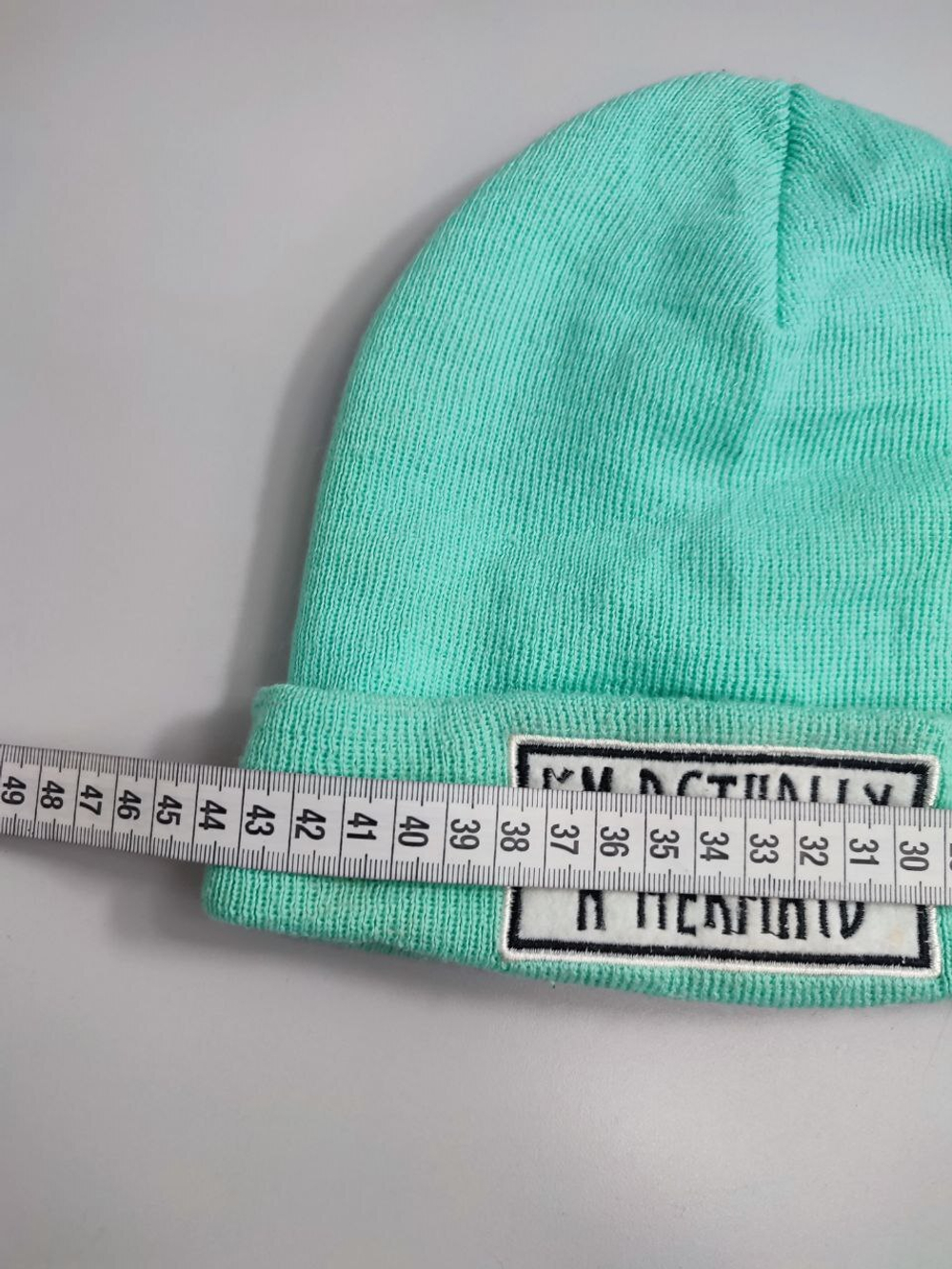 Шапка Modi красивого цвета