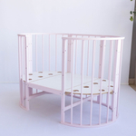 Кроватка-трансформер МАЛЮТКА 7 в 1 с маятником (Розовый)