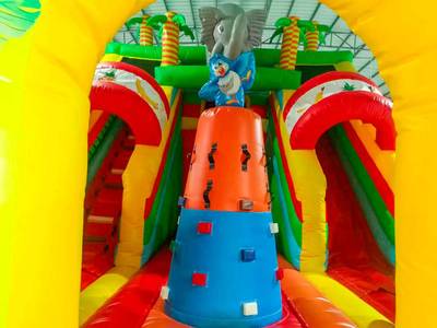 Коммерческий надувной батут «Слоник со скалодромом» 9x6x6