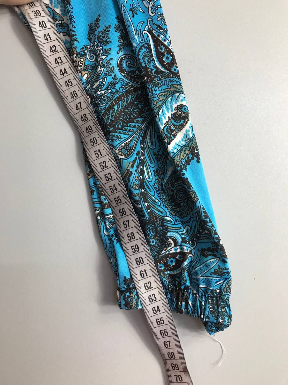 Комбинезон пестрый, визуально на 44 размер