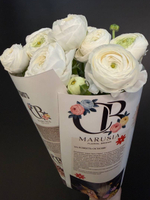 Букет 7 ранункулюсов в цветочной газете.