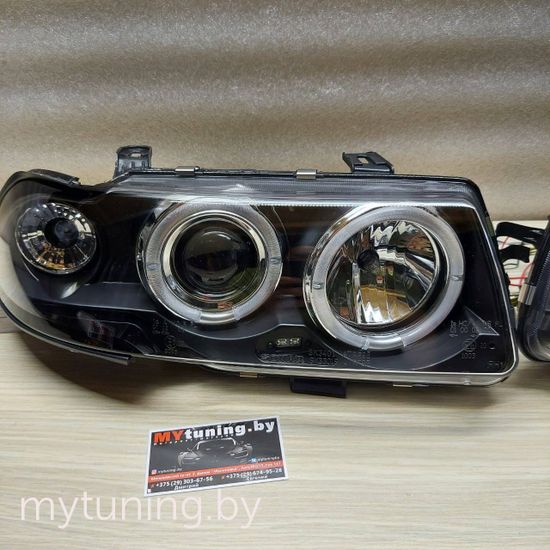 Передние фары Opel Astra F angel eyes black